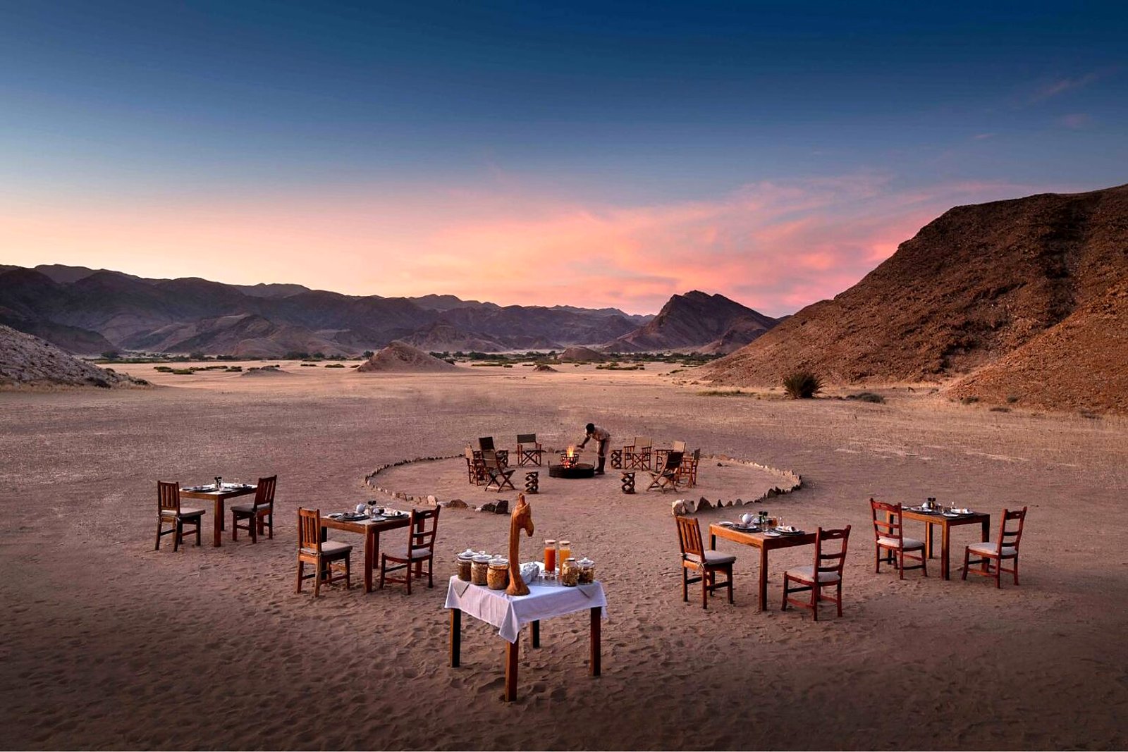 Dinner set out in the dry riverbed under the stars at Hoanib Valley Camp