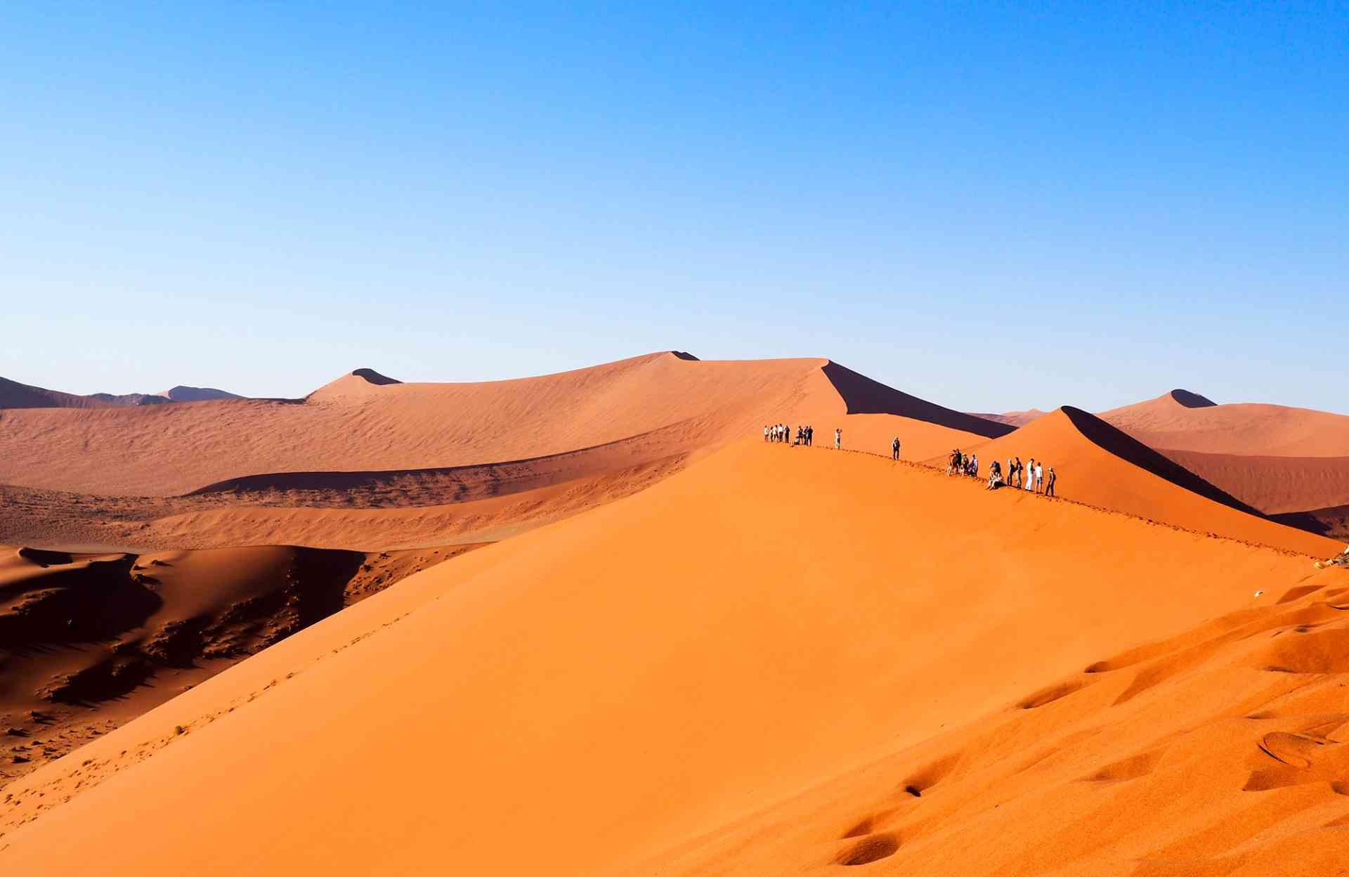 Sunrise over the red dunes of Sossusvlei on a Namibia honeymoon package