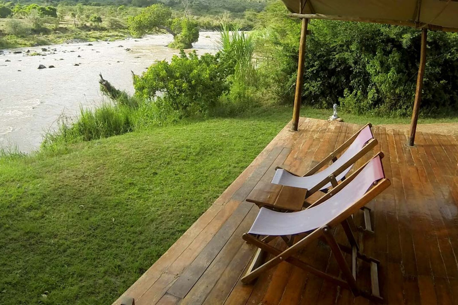 Karen Blixen Camp riverside deck overlooking the Mara River