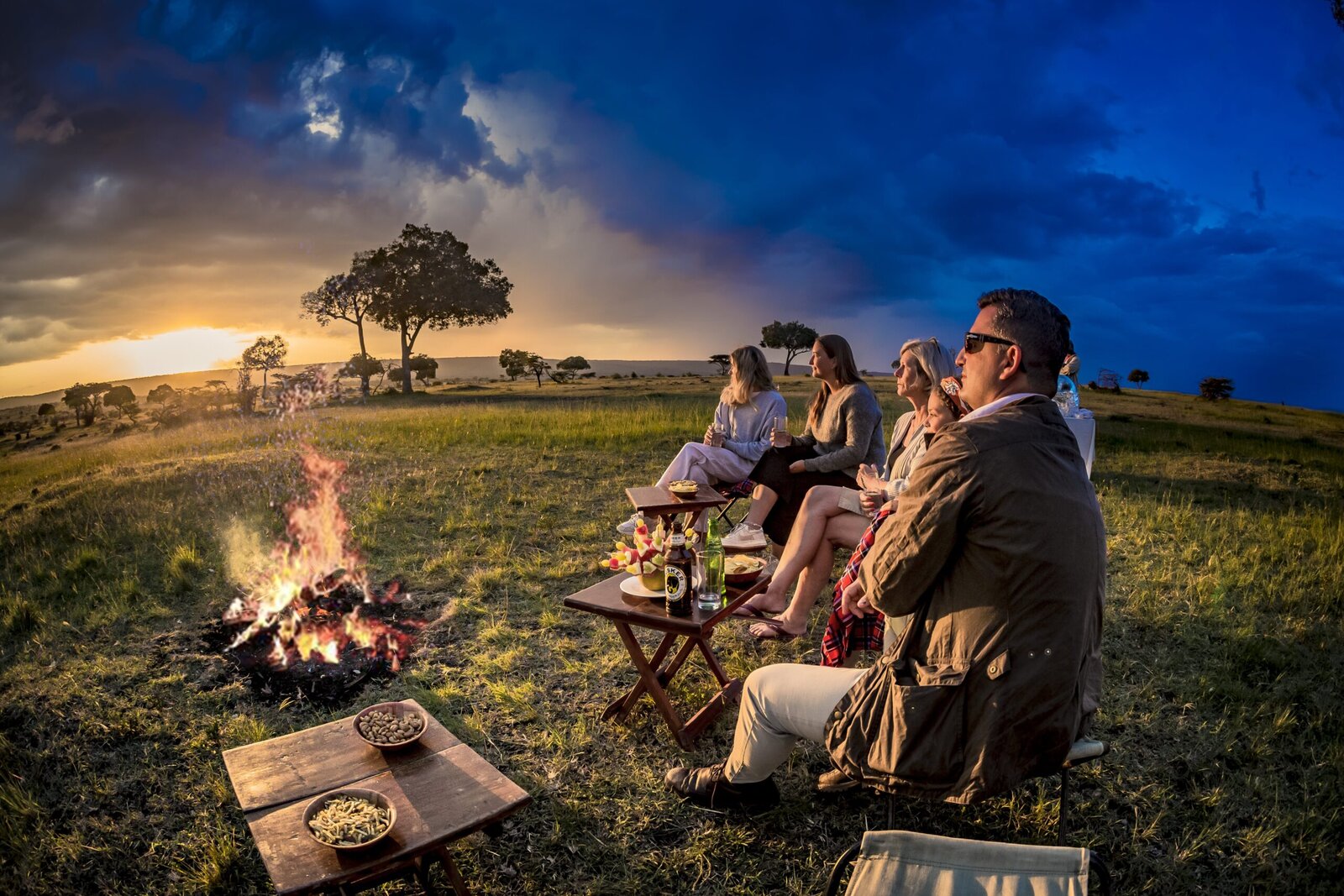 Sundowners on the plains of the Mara North Conservancy at sunset