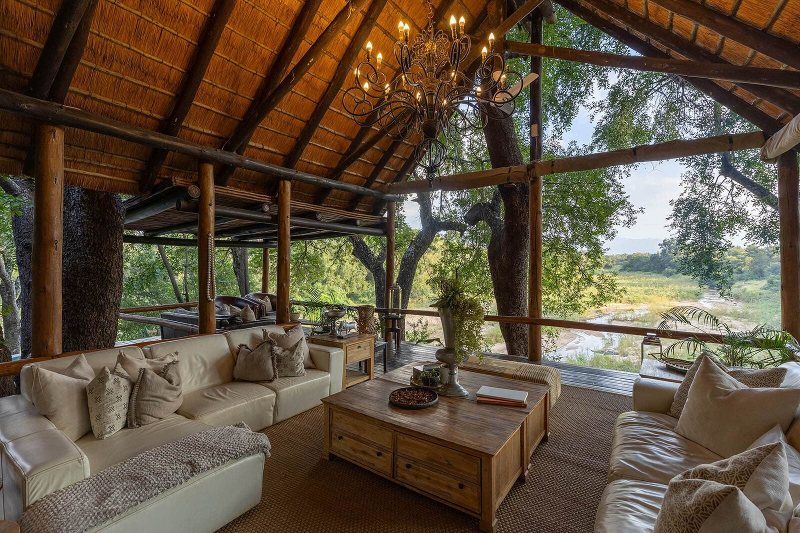 Boutique safari suite with an outdoor stone bath on a private deck at Karongwe Private Game Reserve