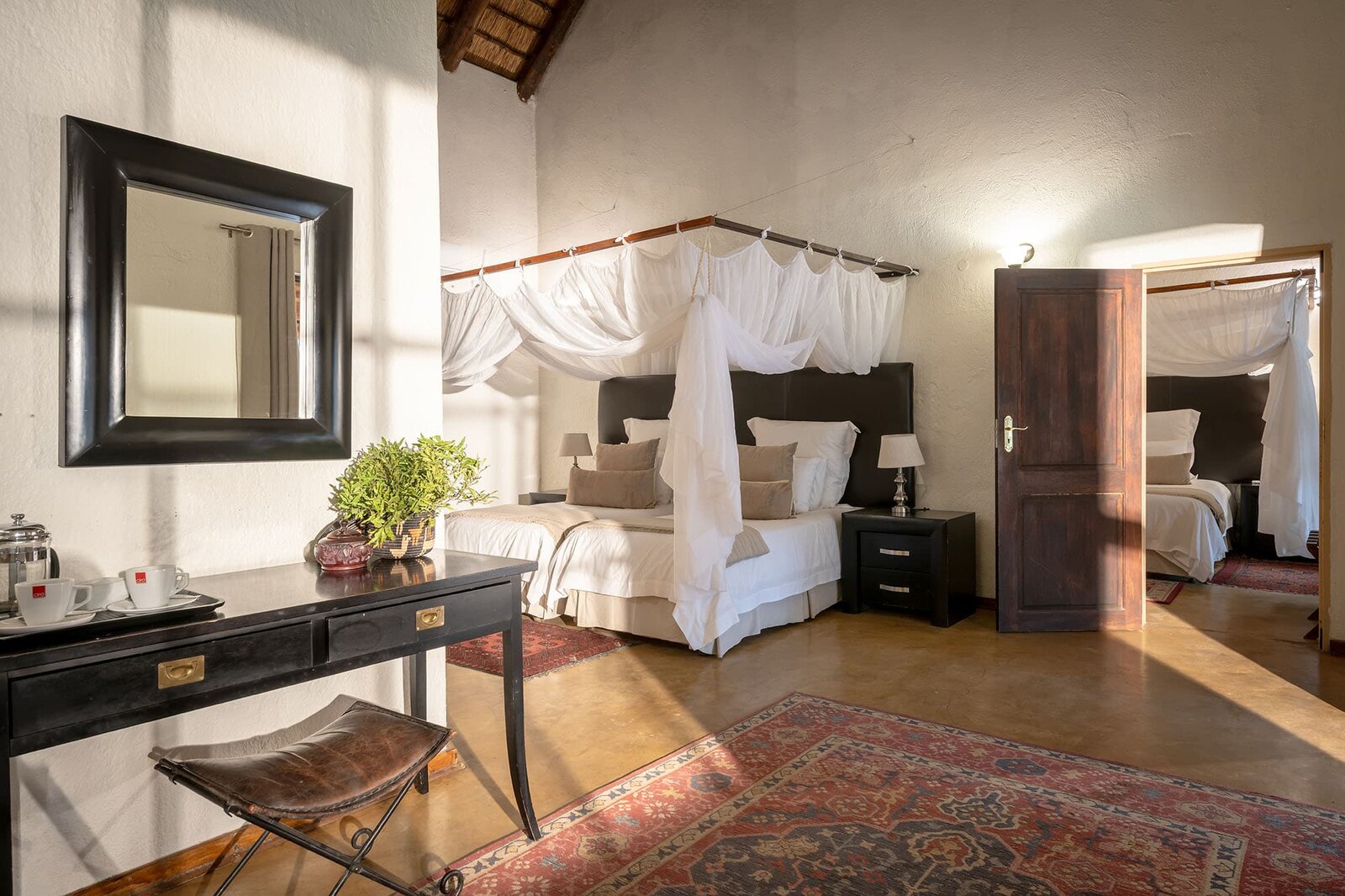 Family-friendly thatched safari lodge with a large pool and indigenous gardens at Karongwe Private Game Reserve