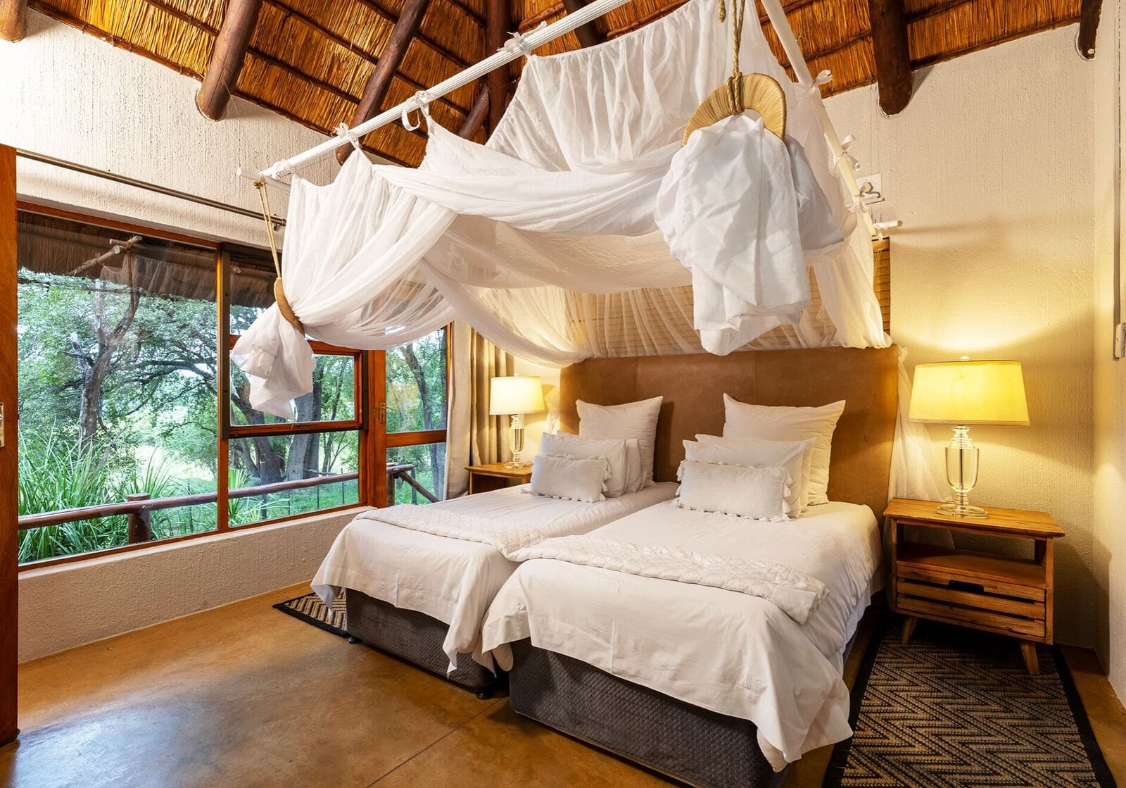 Private exclusive-use safari villa with a plunge pool on a riverbank at Karongwe Private Game Reserve