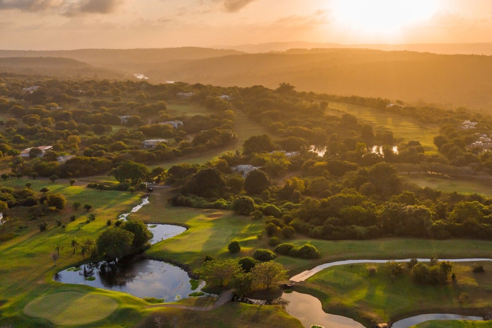 Sunset over a championship golf fairway in East Africa