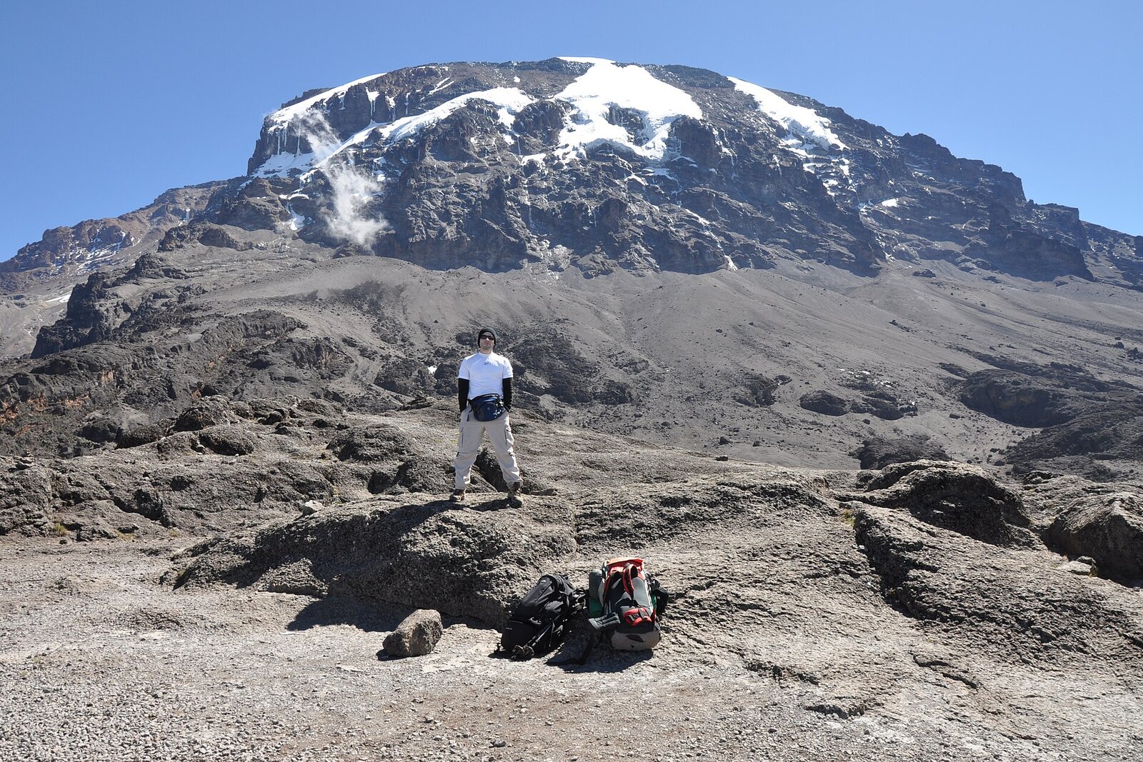 Climber below Kilimanjaro's peak from the top of the Great Barranco Wall