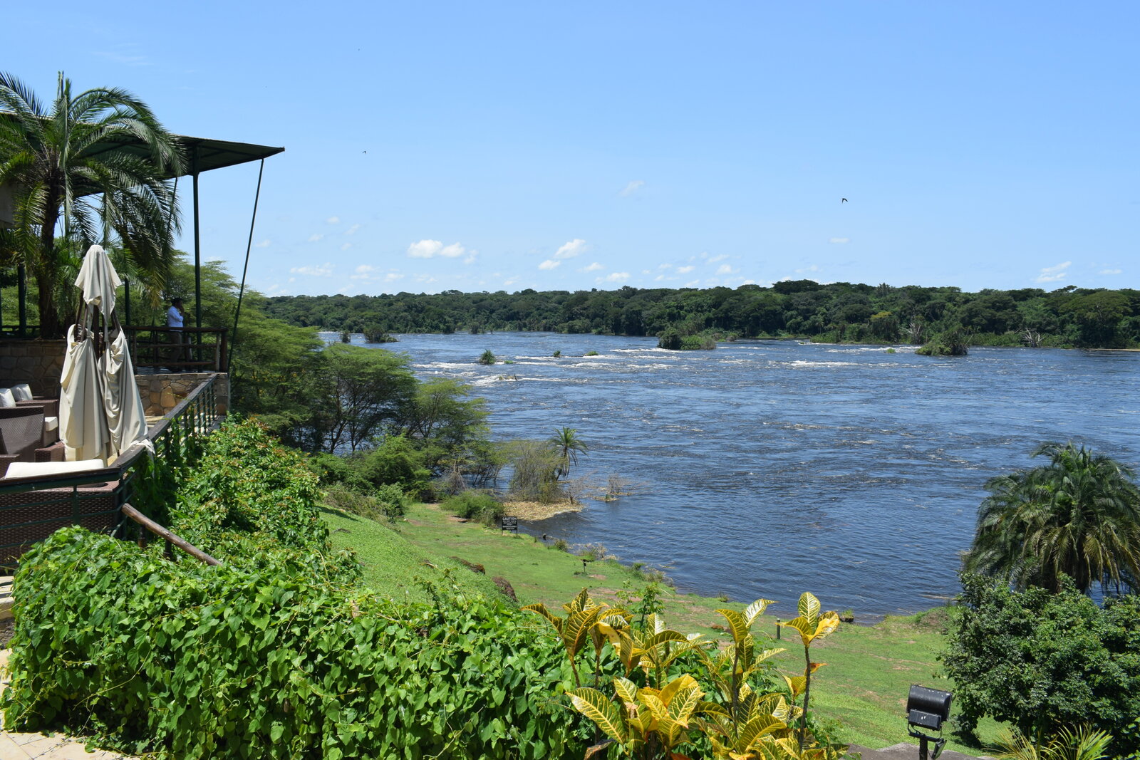 A lodge terrace looking out over a wide river