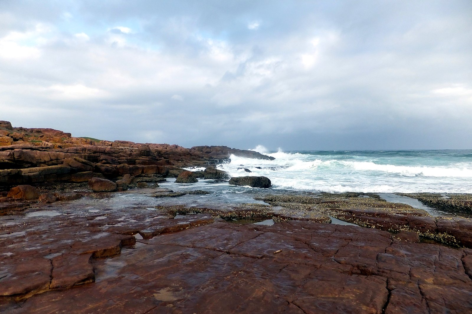 A wild, rocky Indian Ocean coastline in KwaZulu-Natal