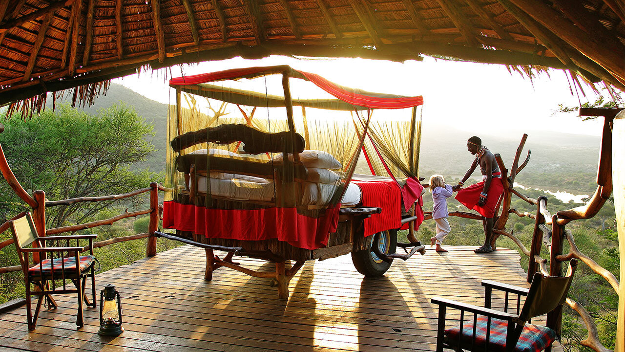 An open-air star bed set out under the stars on Laikipia