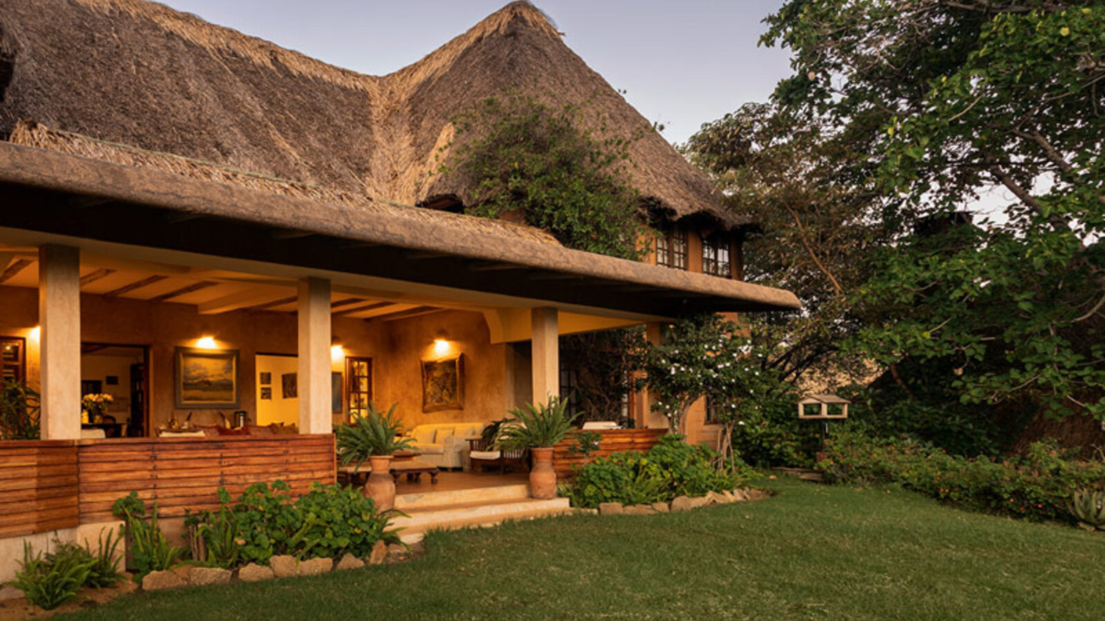 Communal dining at Lewa Wilderness Lodge with farm-to-table cuisine