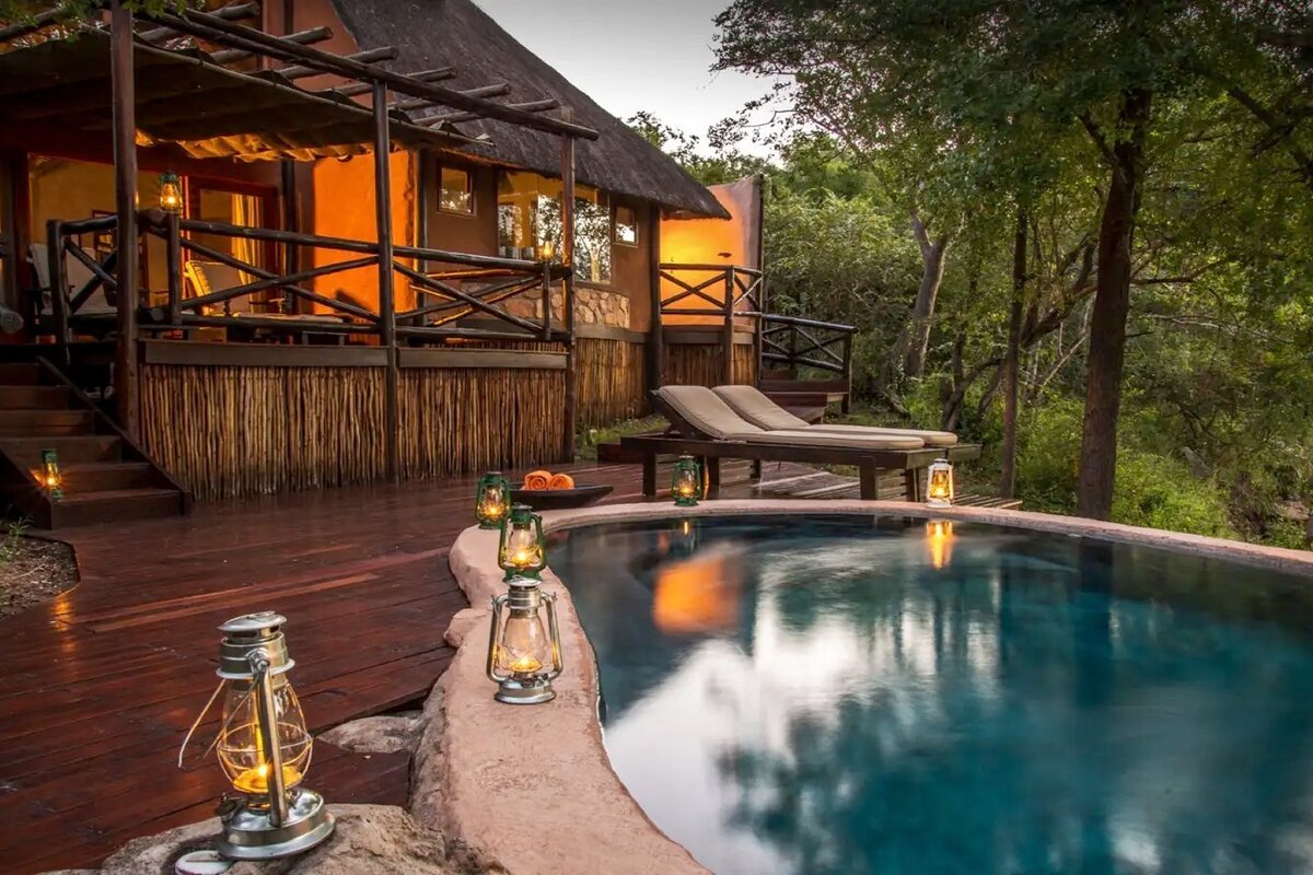 The pool deck and lounge at Lukimbi Safari Lodge overlooking the southern Kruger bush