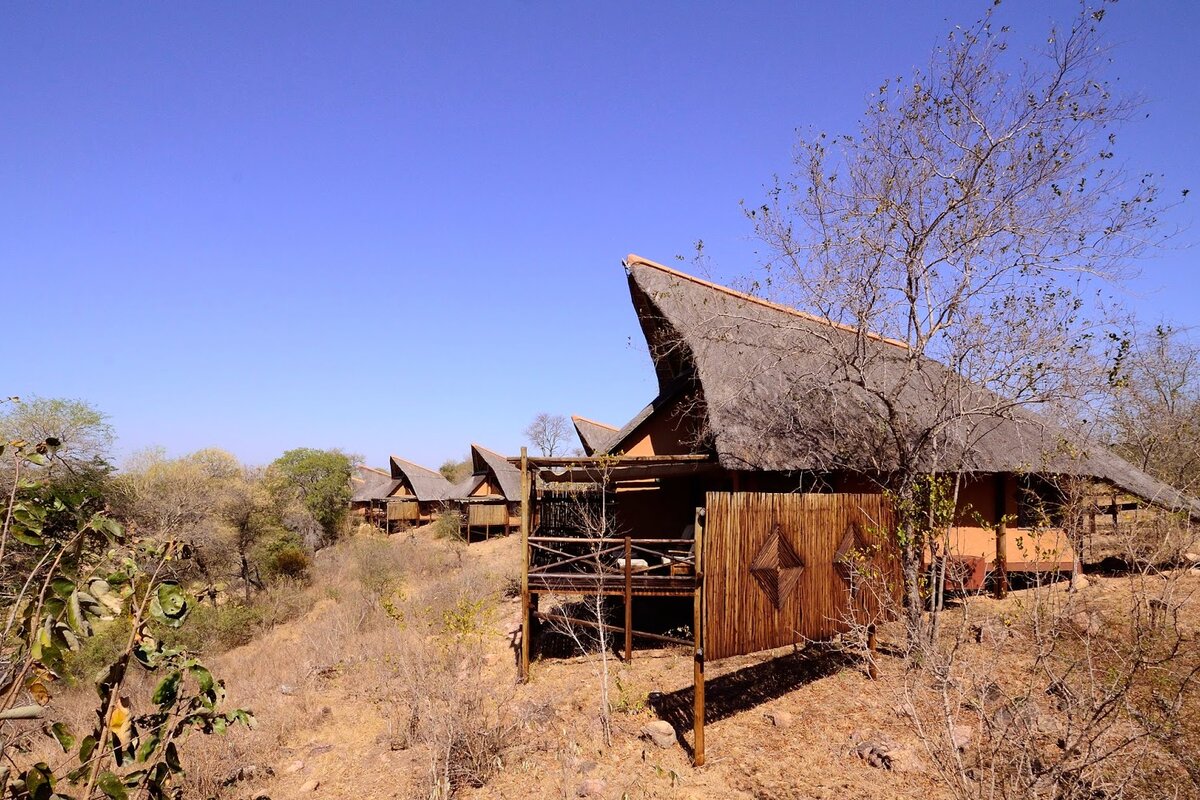 Riverside deck lounge at Lukimbi Safari Lodge, a relaxed family gathering space