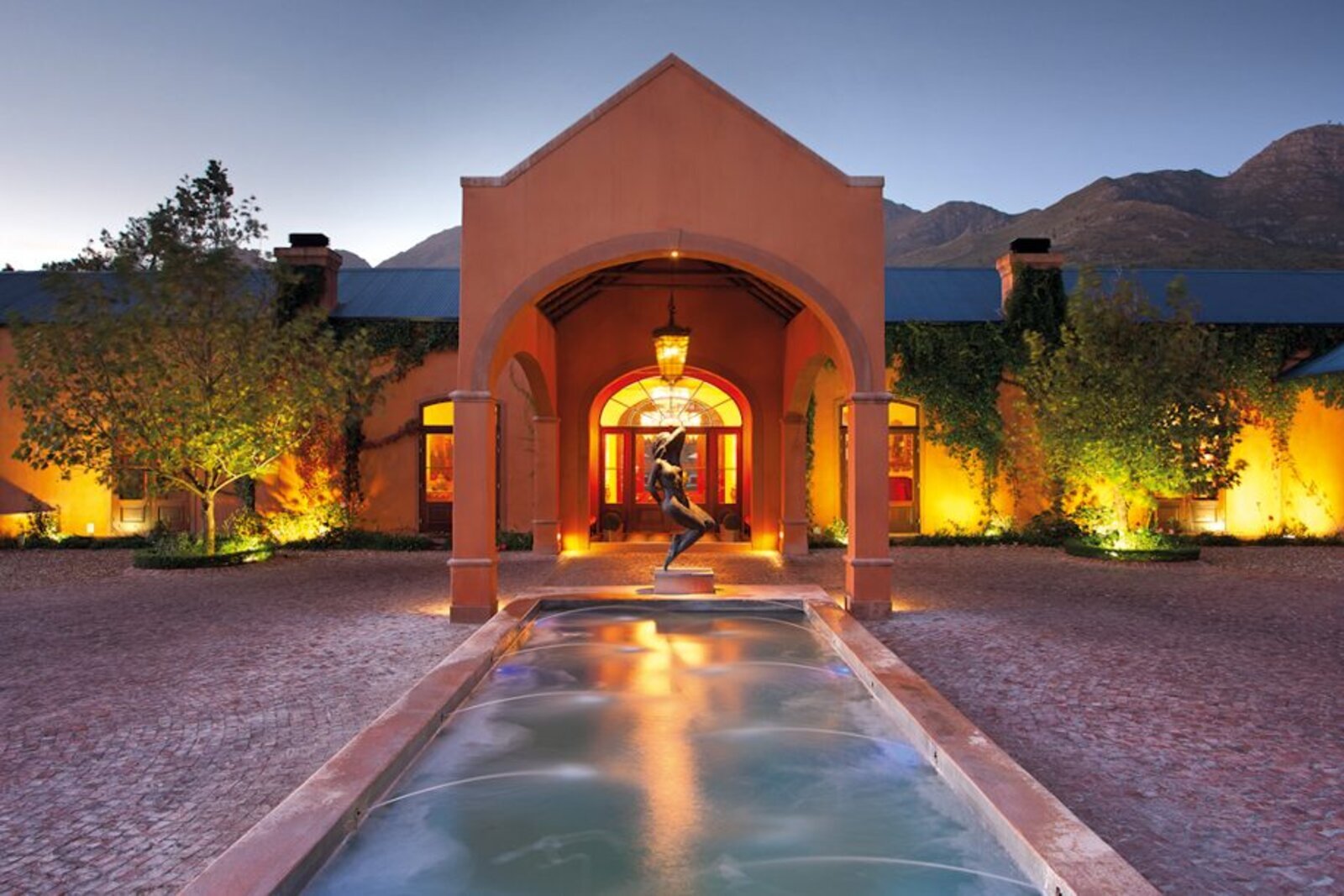 A luxurious Franschhoek estate suite with a private terrace among the vineyards