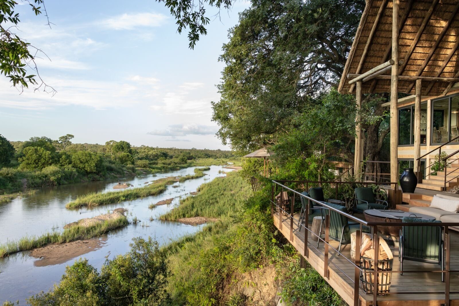 A luxury lodge river-view deck overlooking water in the Sabi Sand