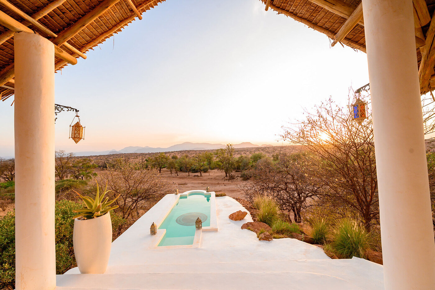 Moorish-style lodge with private plunge pool at sunset in northern Kenya
