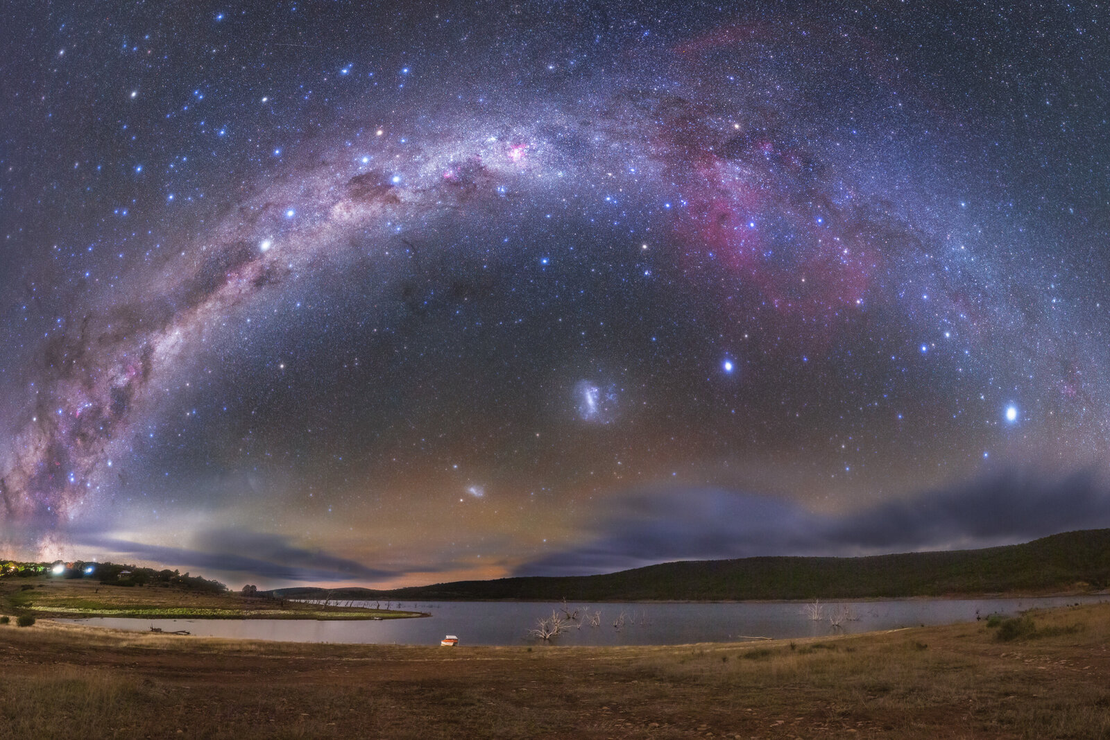 Star-filled night sky over the African savanna