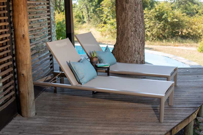 Pool loungers at Makanyi Private Game Lodge in the Timbavati, Greater Kruger, South Africa