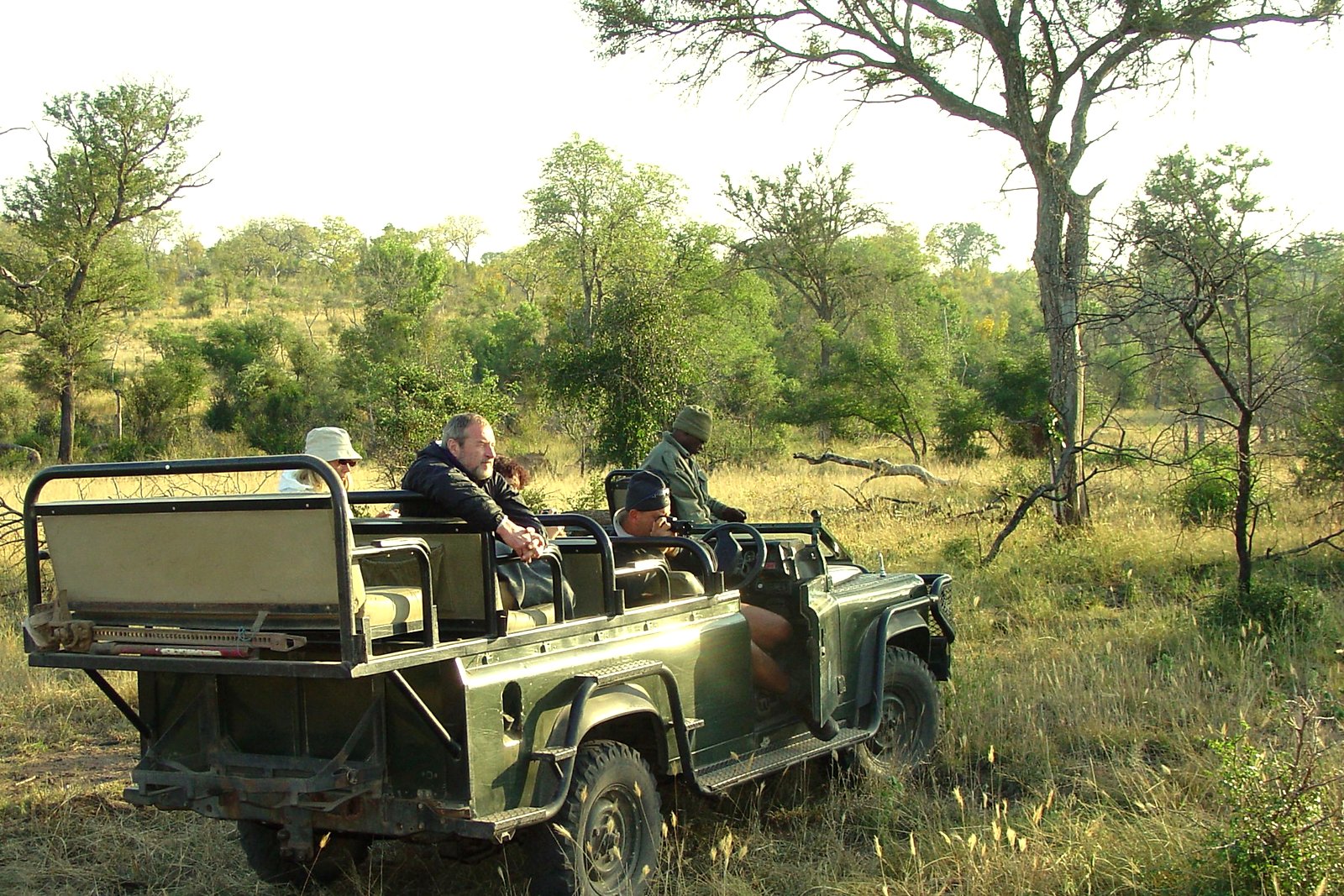 A family on an open game-drive vehicle in a KwaZulu-Natal reserve