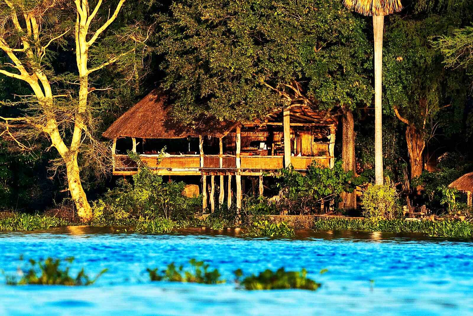 A treehouse suite and pool overlooking Lake Malawi
