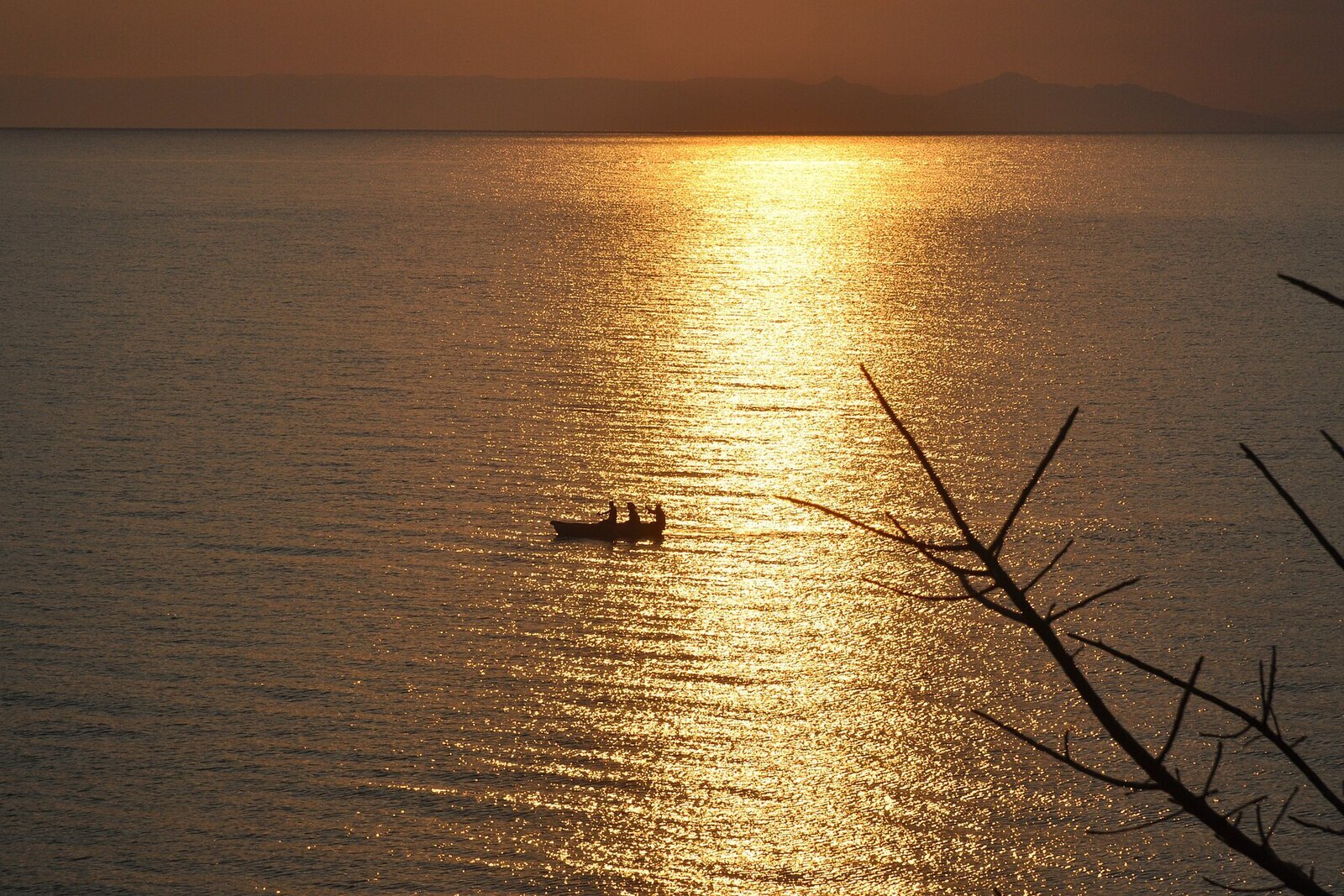 A golden beach and clear water on Lake Malawi