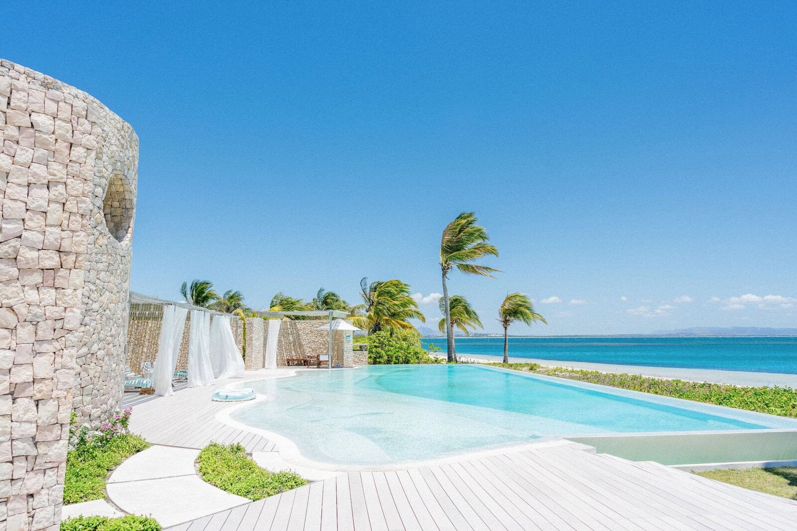 A private villa pool and sun deck above the beach at Miavana, Nosy Ankao, Madagascar