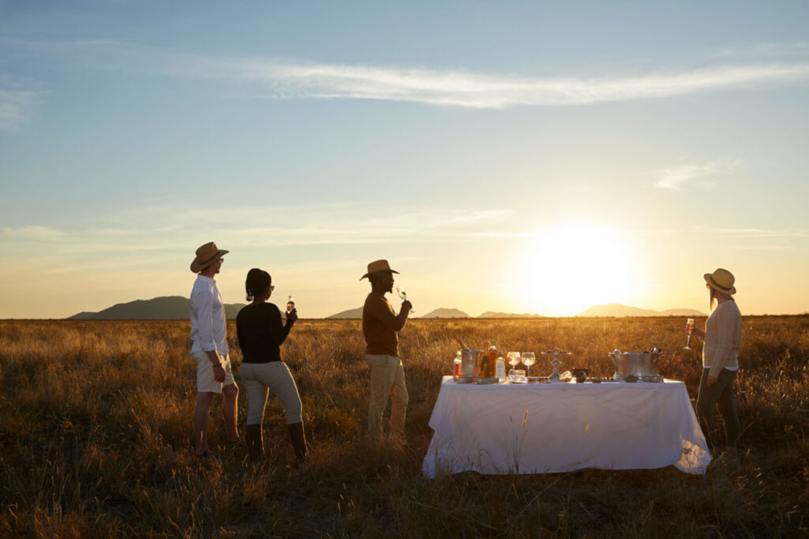 Molori Safari Lodge sundowner bush dining at golden hour