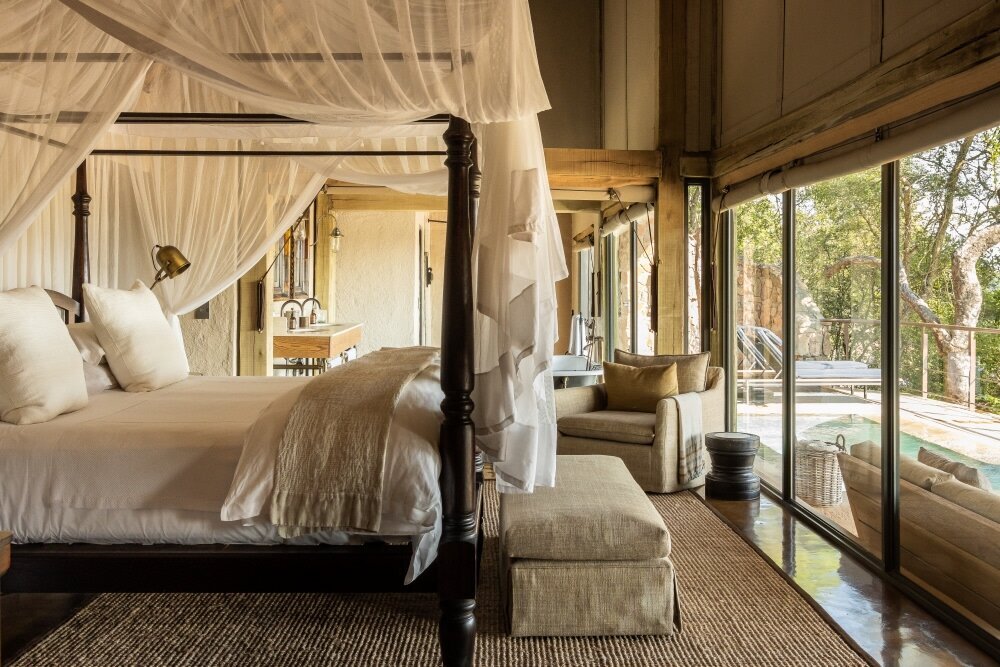 A light-filled Singita Ebony suite with river views on a luxury couples safari in the Sabi Sand