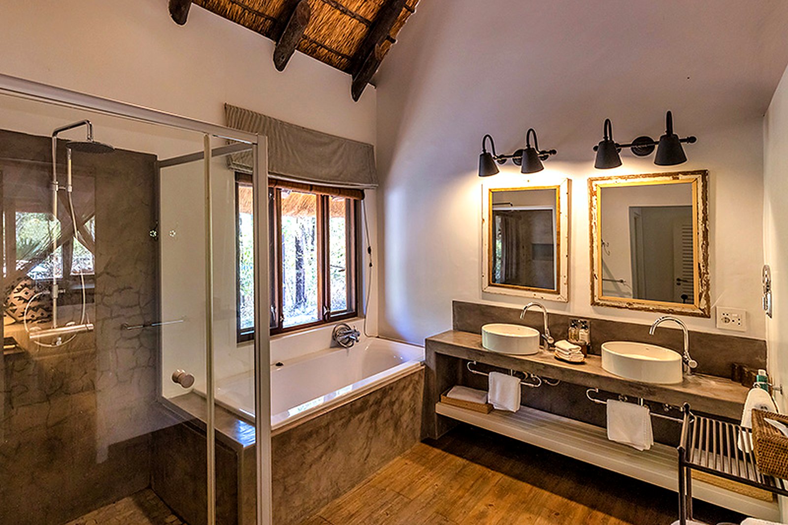 Chalet bathroom with deep tub at Mushara Lodge, Etosha