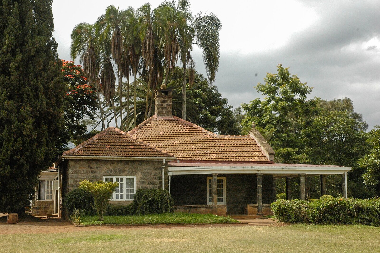 The Karen Blixen Museum farmhouse framed by palms in Nairobi