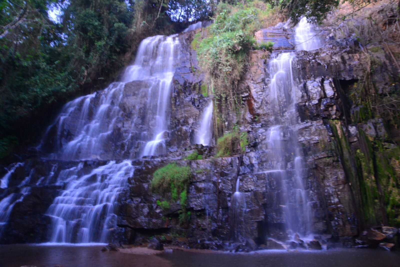 Seasonal waterfall threading the Nyakazu Fault cliff face