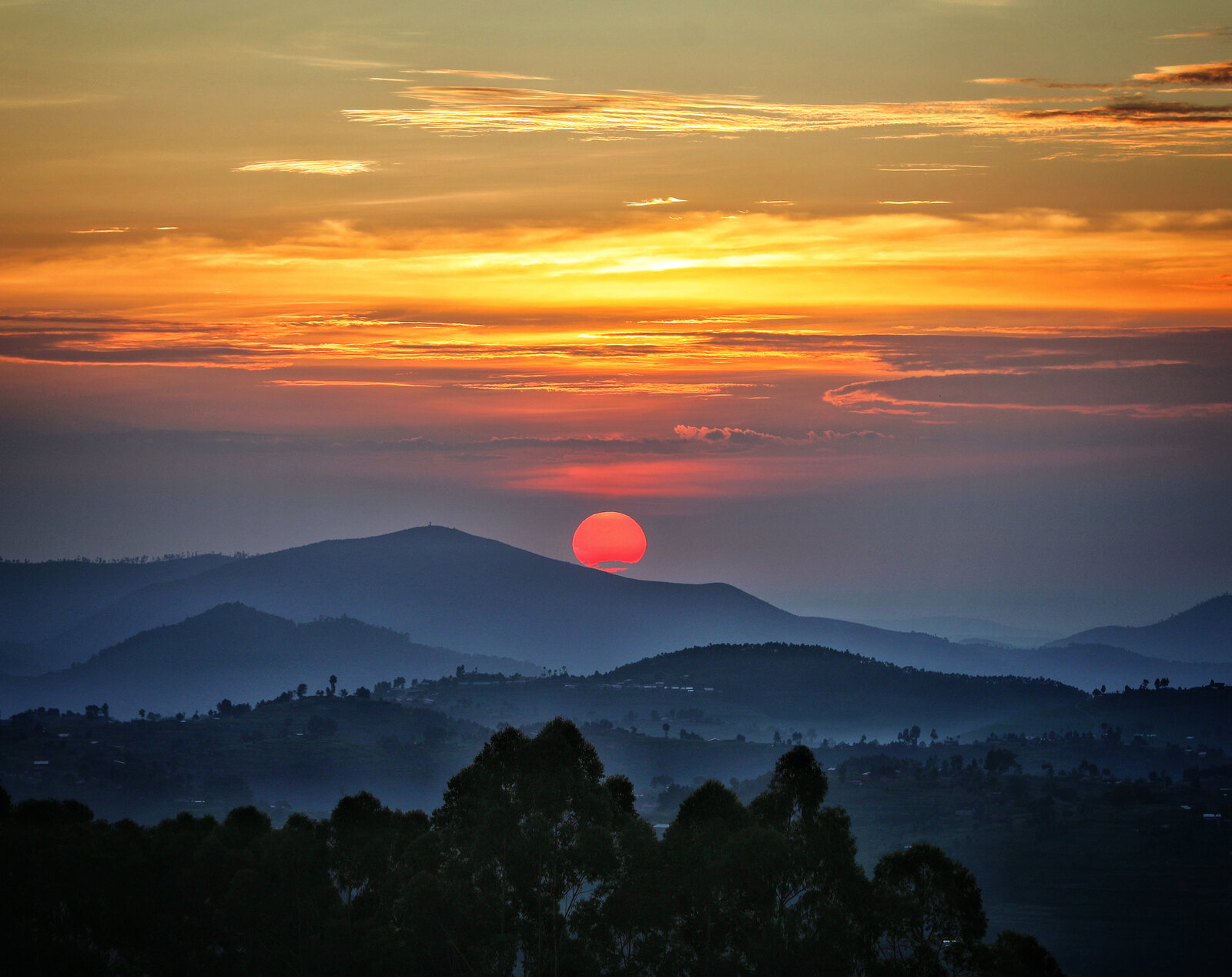 Sunrise over the mist-wrapped ridges of Nyungwe Forest