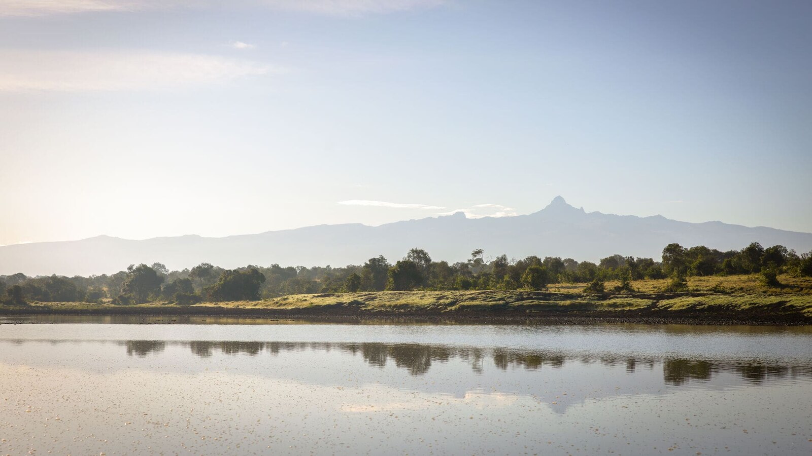 Tent deck overlooking Ewaso Nyiro River with Mount Kenya view