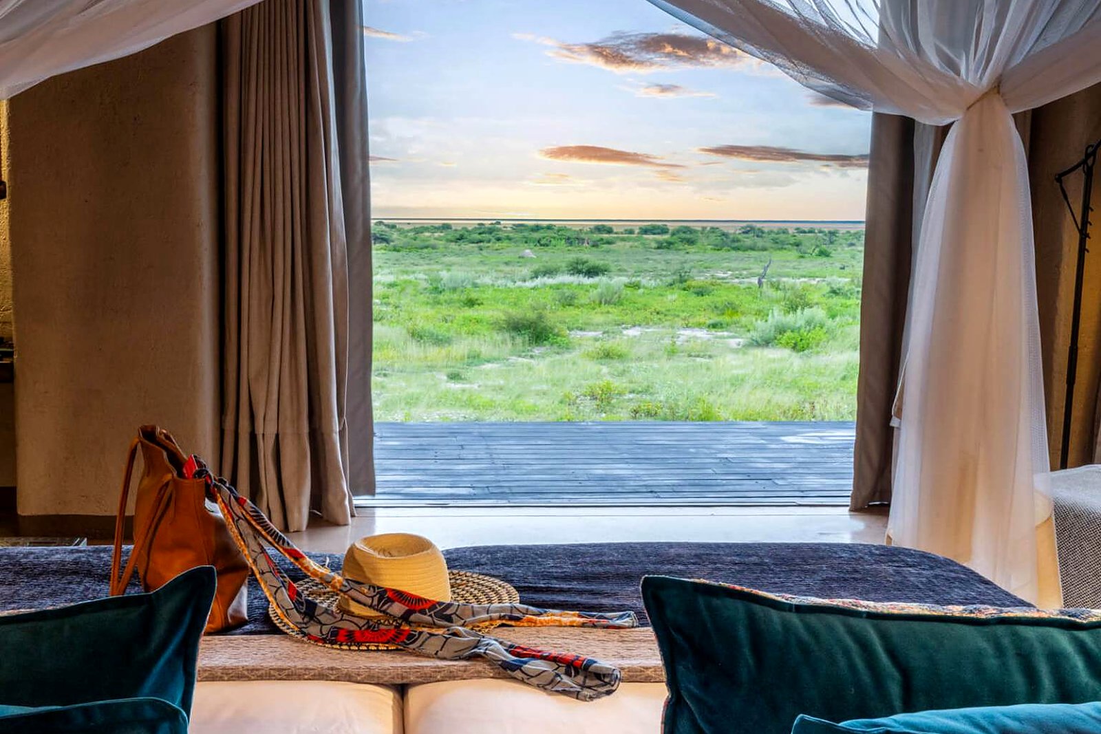 Plains-view room opening to the Onguma Reserve bush at Onguma The Fort
