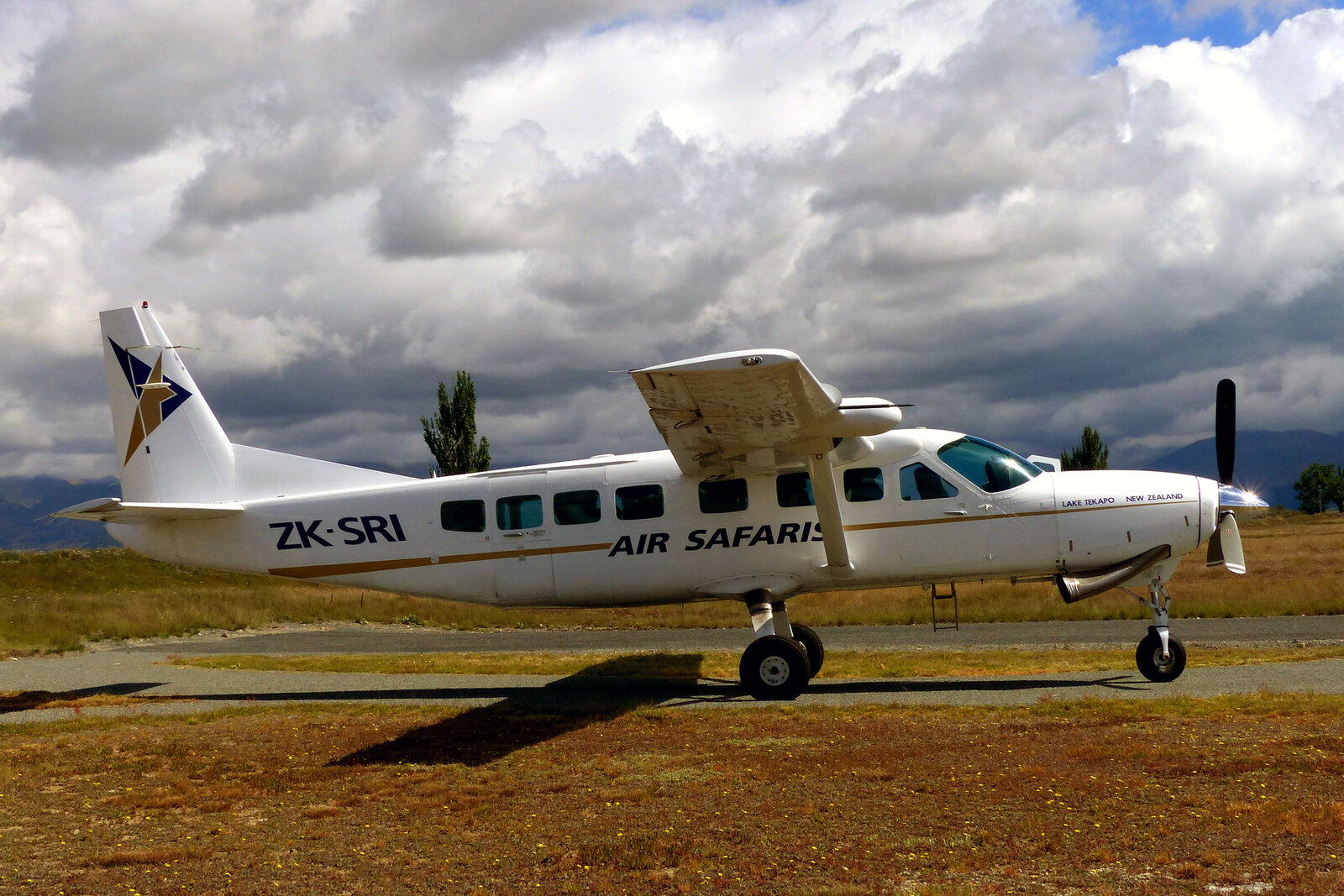 Cessna Caravan light aircraft on an African bush airstrip for a fly-in safari