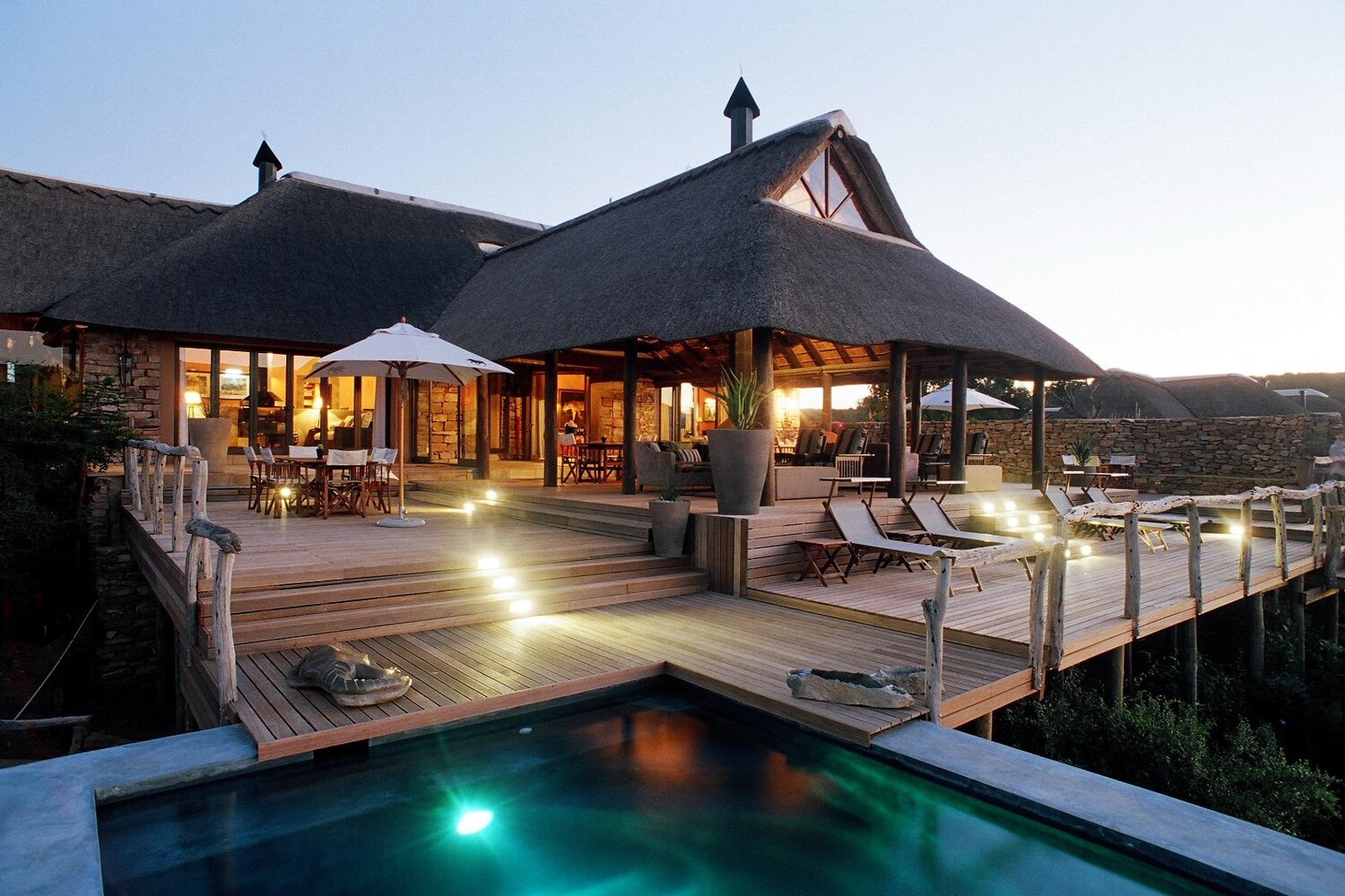 A pool and lake view at Pumba Water Lodge in the Eastern Cape