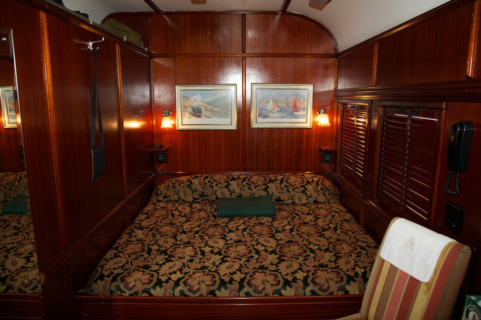 Rovos Rail Deluxe Suite with wood panelling and vintage styling
