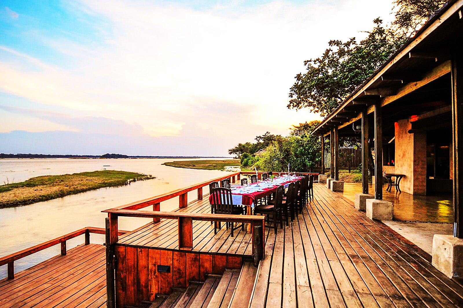 A riverside dining deck overlooking the Zambezi River