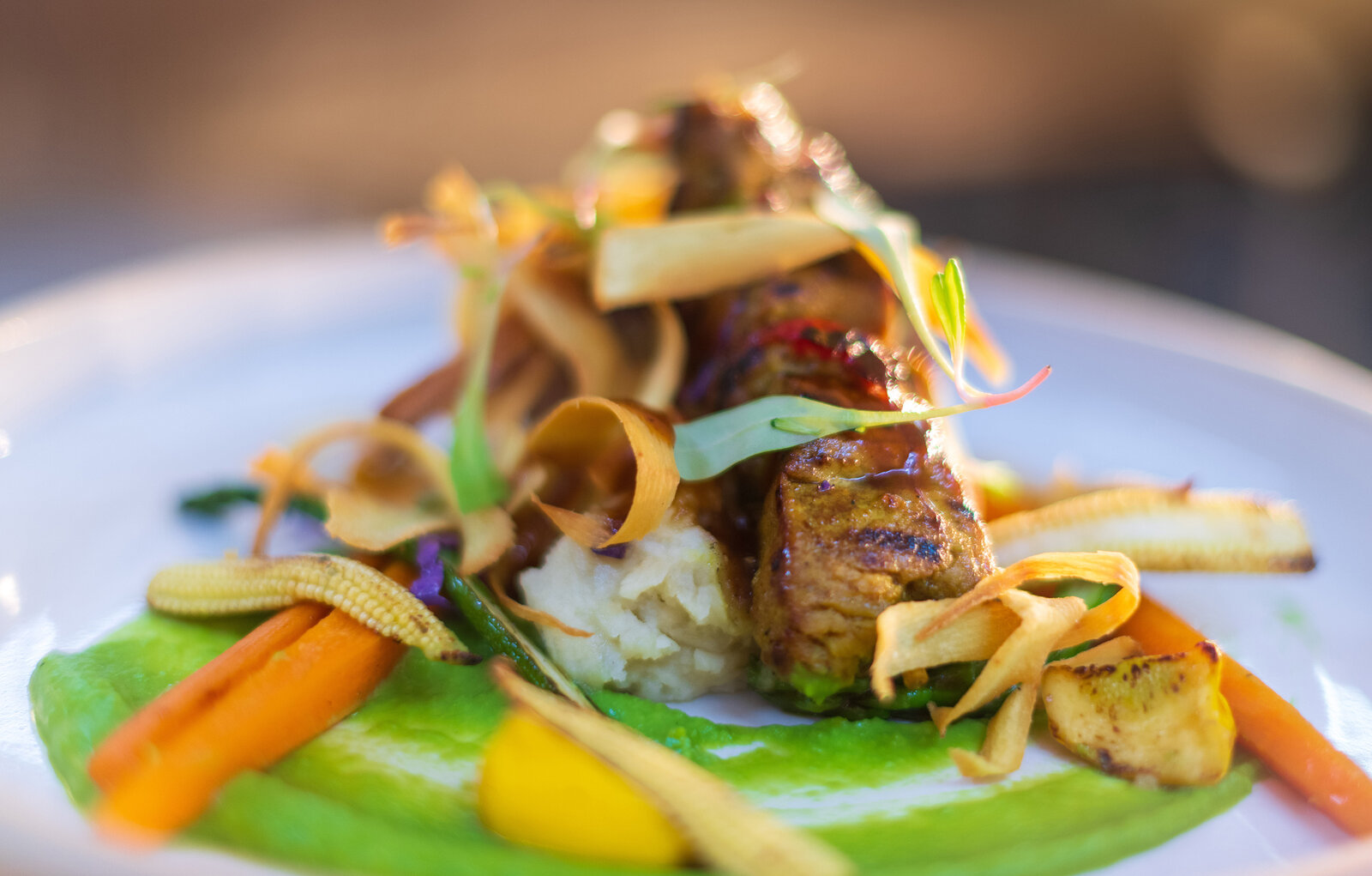 Gourmet plated cuisine at Sabi Sabi Earth Lodge
