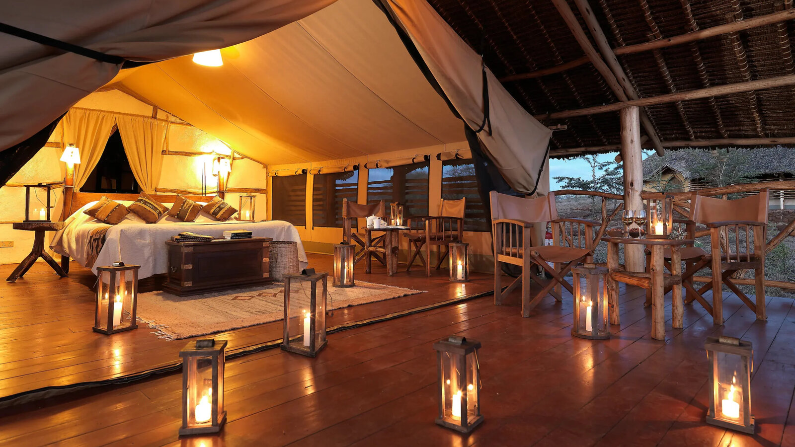 Satao Elerai deluxe tent interior with bed and Kilimanjaro-facing view