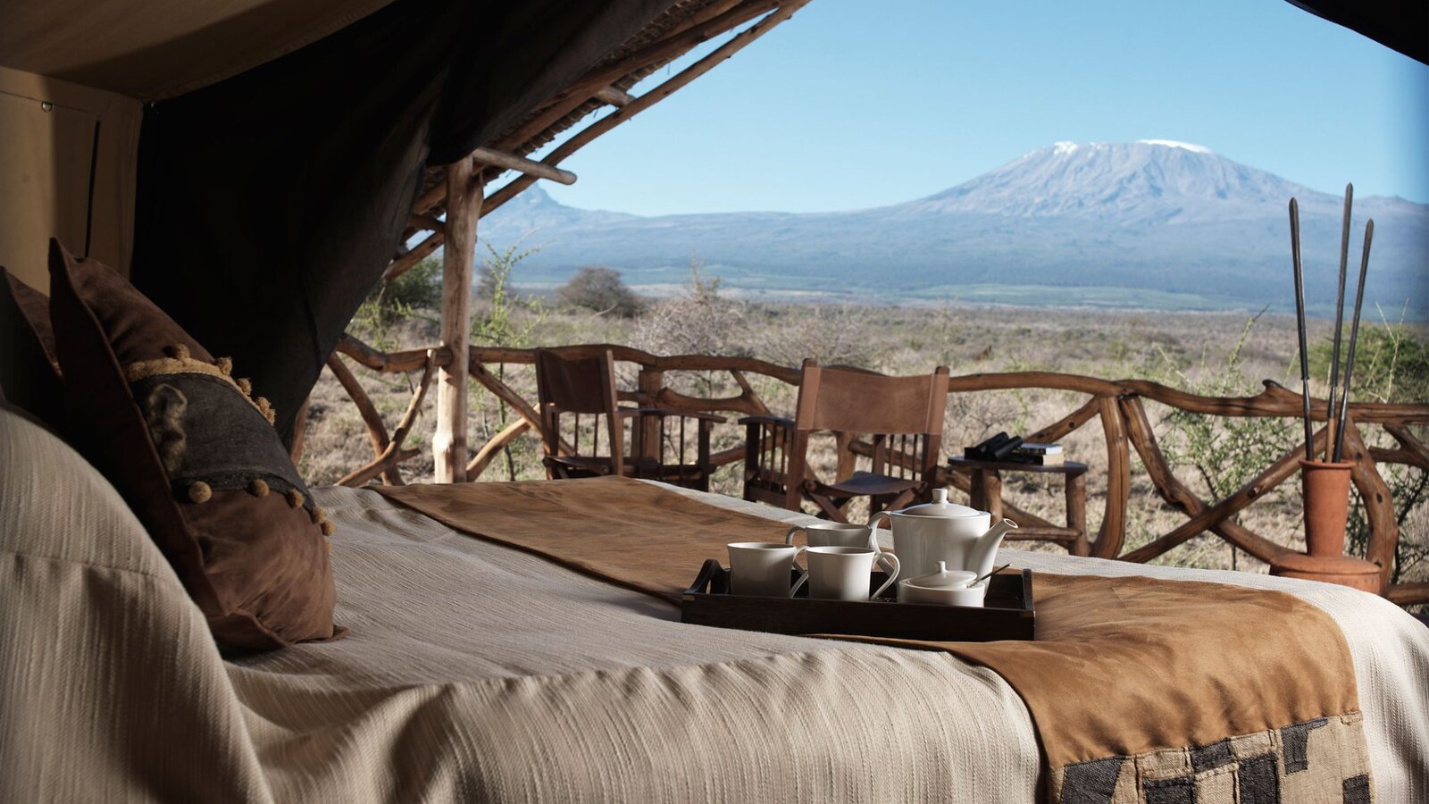 Satao Elerai lodge suite interior built from rock and acacia wood