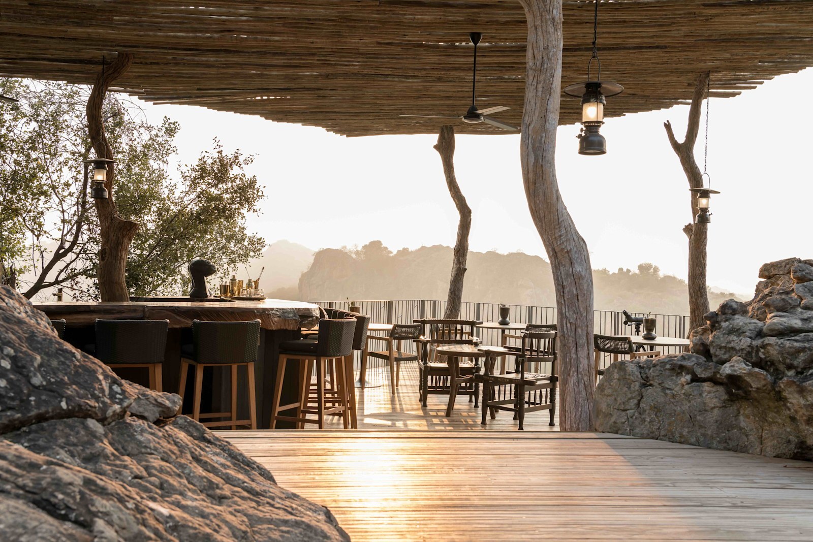 The open-sided bar and deli deck at Singita Pamushana with sweeping views over the Malilangwe Reserve