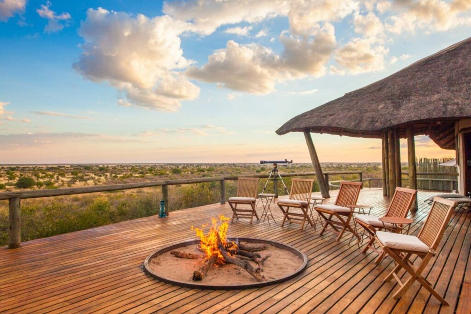 Fire pit and lounge at Tau Pan Camp at dusk, Central Kalahari