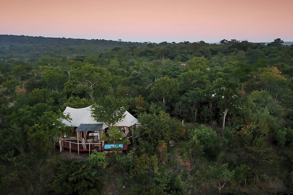 Dining and lounge deck with gorge views at The Elephant Camp