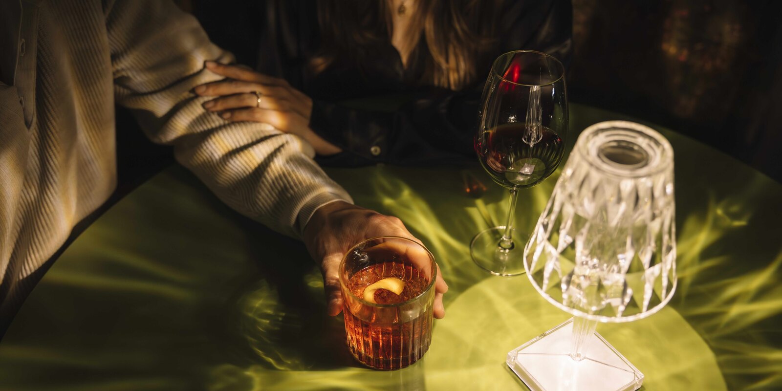 A cocktail and whisky served at the bar at The Silo Hotel