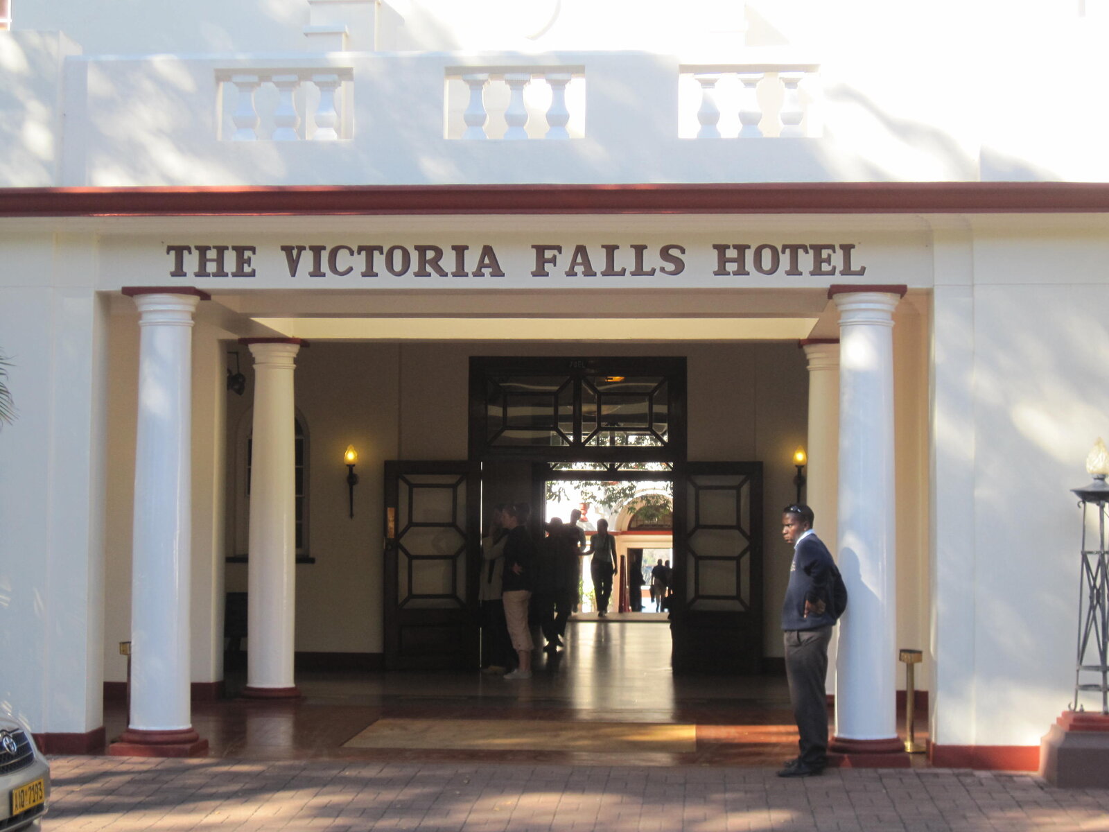 The porte-cochere entrance to The Victoria Falls Hotel beneath its 1904 portico