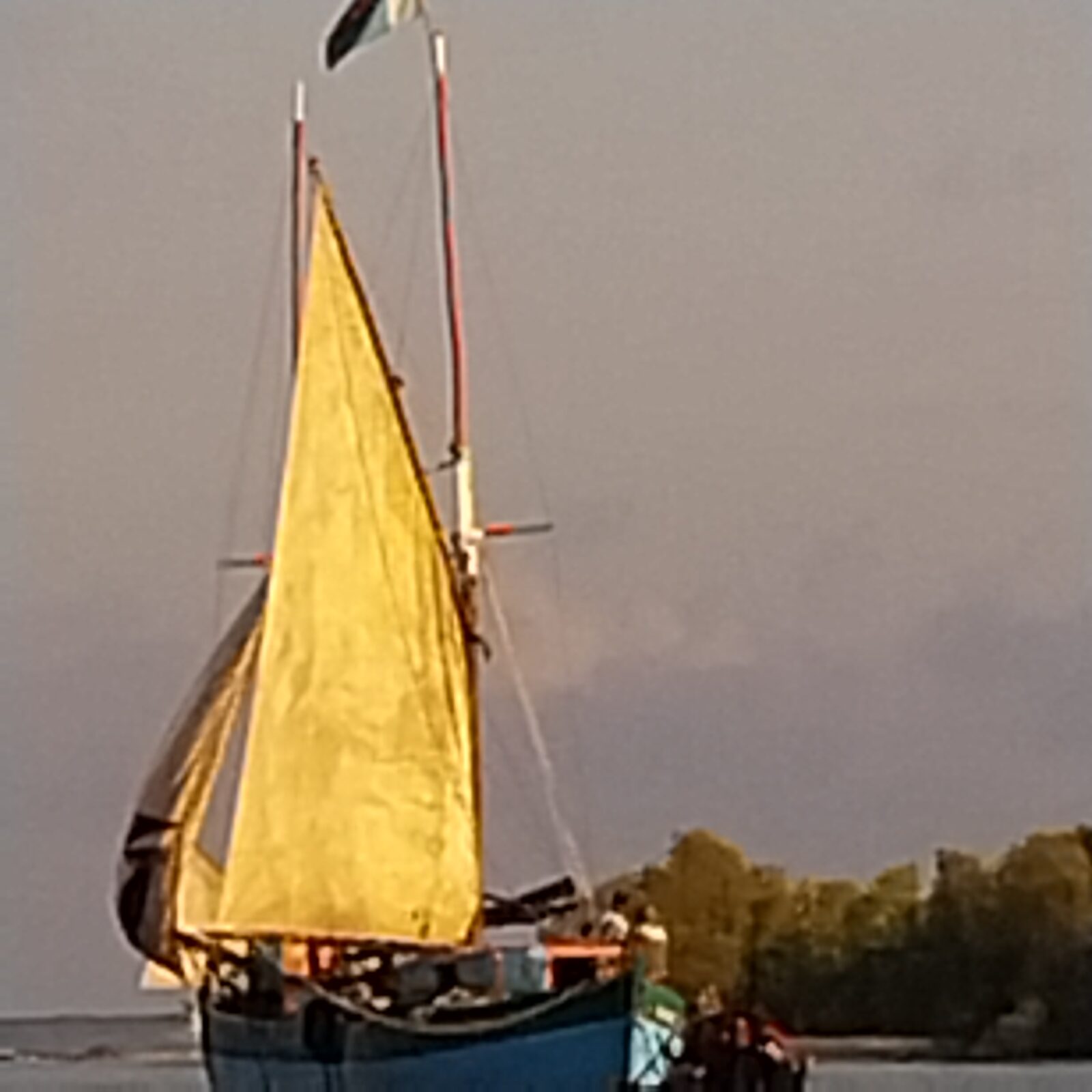 A traditional pirogue under sail off the Madagascar coast