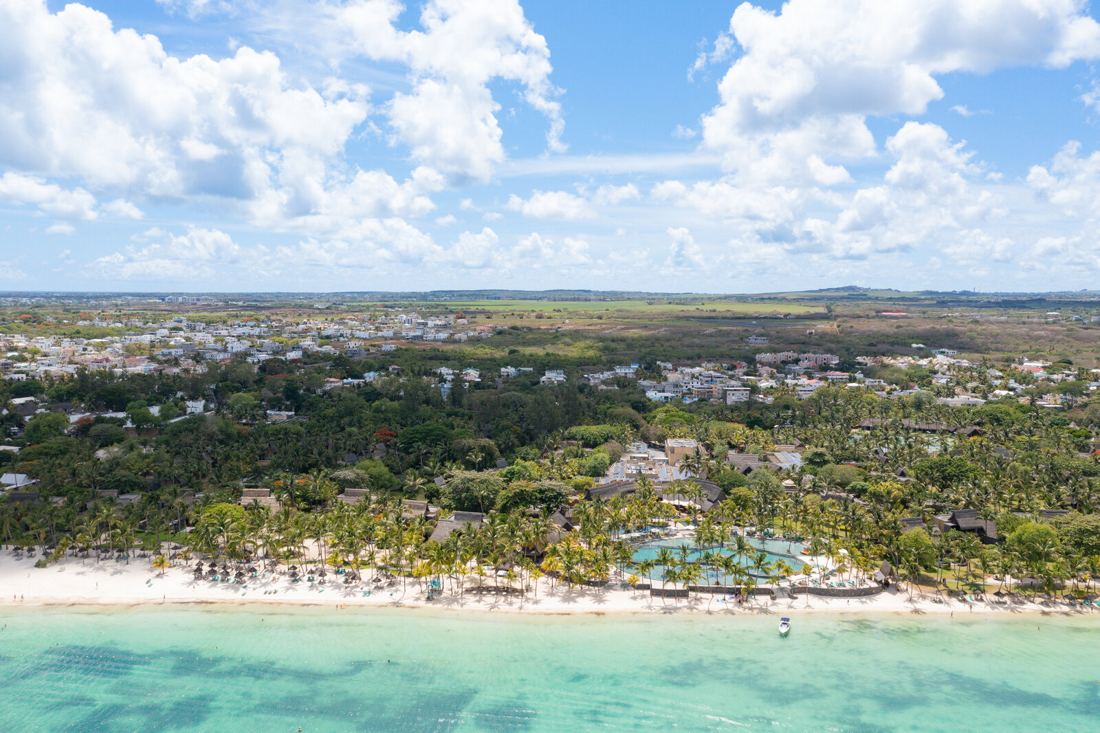 Aerial view of a beachfront family resort on the Mauritius coast