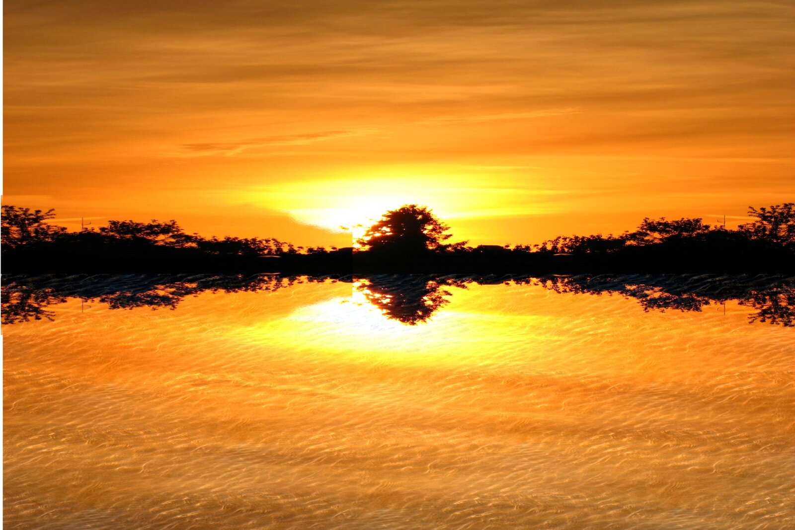 Dramatic sunset reflected on Lake Tanganyika, Burundi