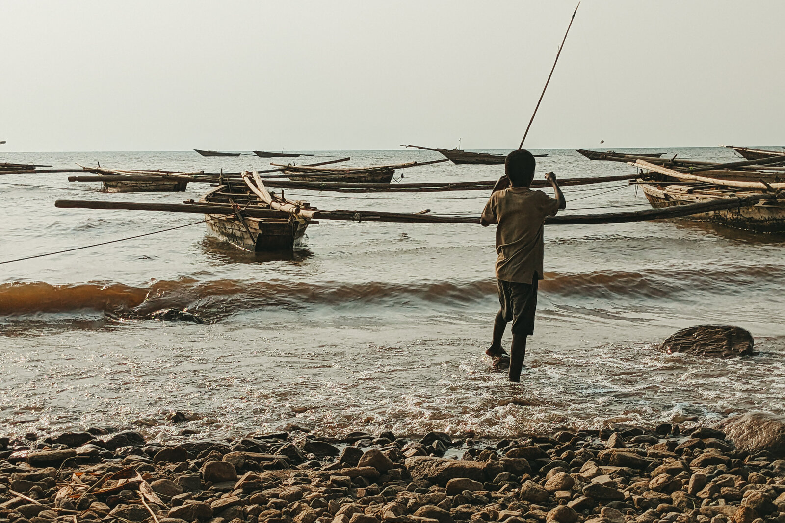 Fishing pirogues moored on the shore of Lake Tanganyika