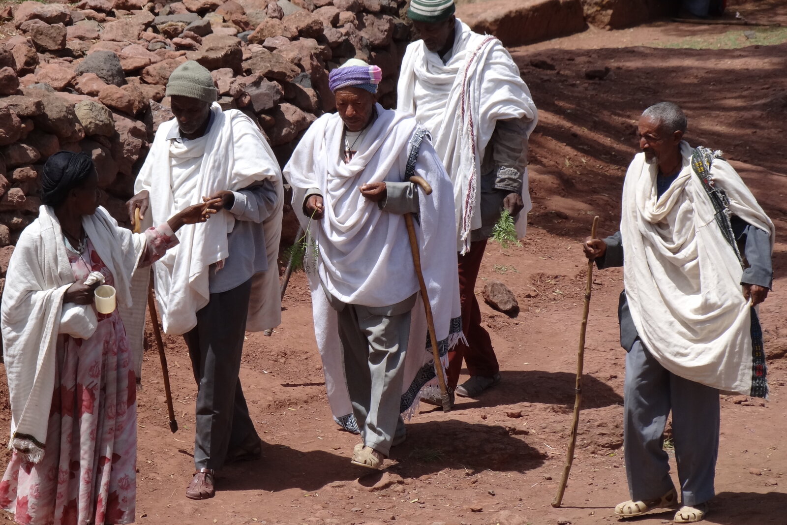 Ethiopian Orthodox pilgrims outside a rock church at Lalibela