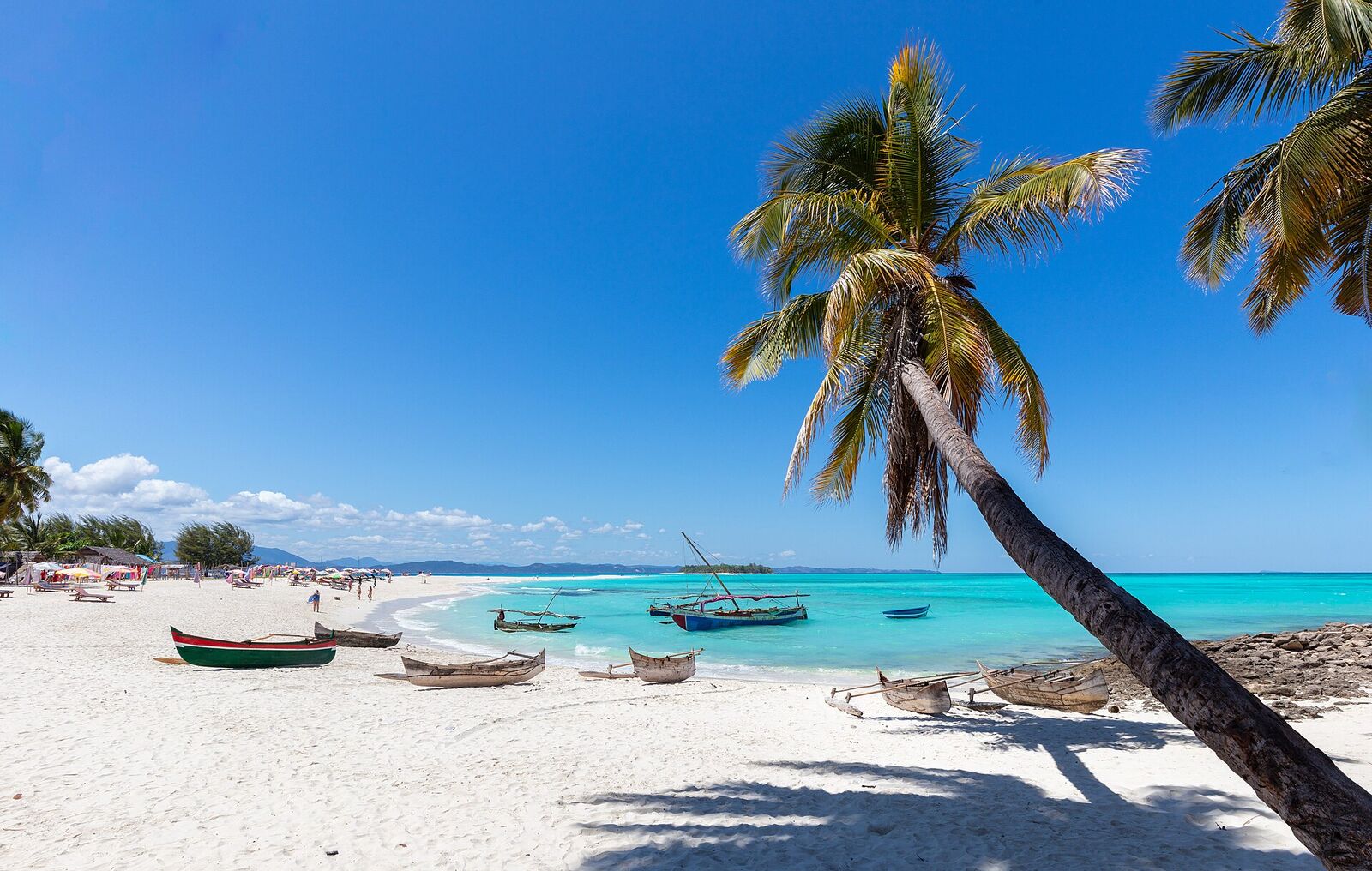 A turquoise lagoon and white-sand beach in the Nosy Be archipelago